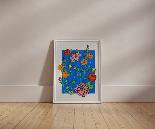 Bright and colorful Vibrant Blooms floral artwork displayed in a modern frame against a blue background.
